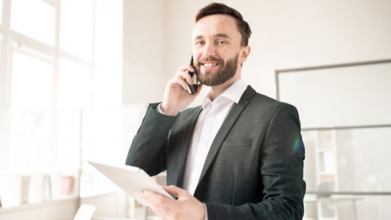 Man with offer and phone